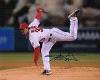 Signed C.J. Wilson